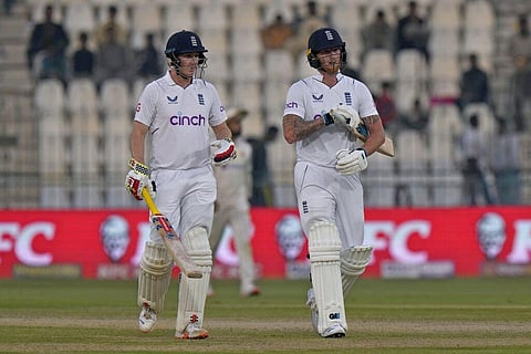 England's Harry Brook, (L), and Ben Stokes walk off the field at the end of day 2 of the second test cricket match against Pakistan in Multan, Dec. 10, 2022. (Photo | AP)