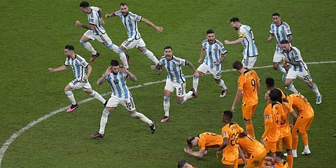 Argentina players celebrate at the end of the World Cup quarterfinal soccer match between the Netherlands and Argentina.(Photo | AP)