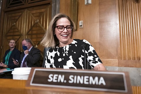 Sen. Kyrsten Sinema, D-Ariz., arrives for a meeting of the Senate Homeland Security Committee at the Capitol in Washington (File Photo | AP)
