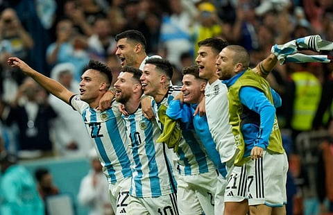 Argentina players celebrate after defeating the Netherlands off penalties during the World Cup quarterfinal soccer match between the Netherlands and Argentina. (Photo |AP)