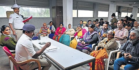 People share their grievances during the Citizens’ Forum Traffic meeting with Basavanagudi Traffic Police officials in Bengaluru on Saturday | Shashidhar Byrappa