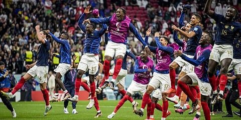 France players celebrate their team victory over England at the end of the World Cup quarterfinal soccer match.(Photo | AP)