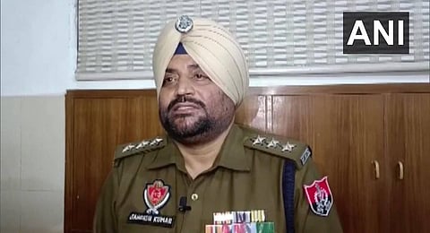 Two videos went viral, in one a man was seen stealing sacks of wheat from a truck & in another the accused was seen tied in front of the truck by the driver & brought to the station. (Photo | ANI)