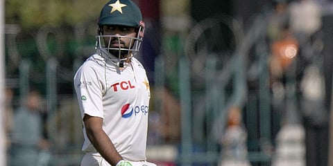Pakistan's Babar Azam walks off the field after his dismissal during the third day of the second test cricket match against England.(Photo | AP)