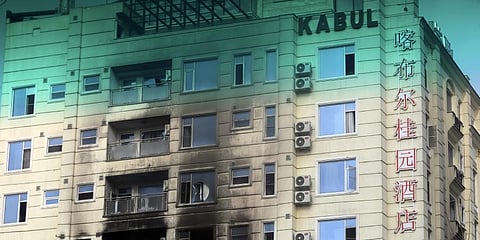 A damaged hotel building sits charred from fire after an attack in Kabul, Afghanistan, Tuesday, Dec. 13, 2022. (Photo | AP)
