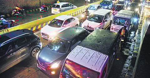 Commuters stuck in a traffic jam in Nungambakkam on Monday | R Satish babu