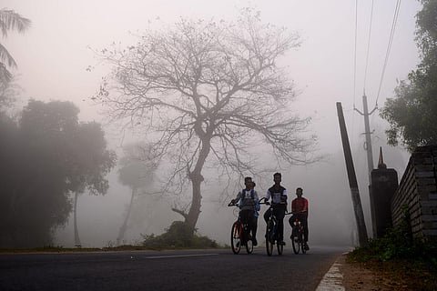 Here is a compilation of photographs from across the country shot by our lensmen this week. Children cycle to tuition classes as a thick layer of fog engulfed a village road near Nischintakoili area in Cuttack. (Photo | Debadatta Mallick, EPS)