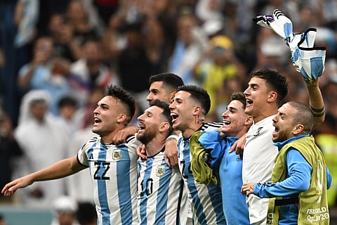 A jubilant Messi and his teammates. (File photo | AFP)