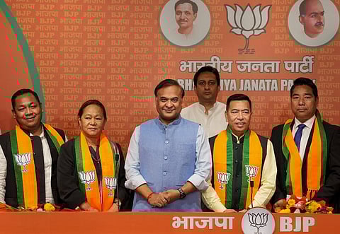 Four MLAs from Meghalaya - Benedict Marak, Himalya Muktan, Ferlinc A Sangma, Samuel Sangma join BJP in the presence of Assam CM Himanta Biswa Sarma. (Photo | PTI)