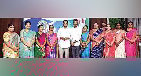 Chief Minister YS Jagan Mohan Reddy with party activists of Mylavaram Assembly constituency on Thursday I Express
