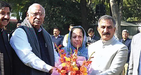 Congress president Mallikarjun Kharge with Himachal Pradesh CM Sukhvinder Singh Sukhu and state party chief Pratibha Singh in New Delhi on Thursday. (Photo| PTI)