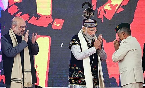 Prime Minister Narendra Modi, Meghalaya Governor Brig. BD Mishra (Retd.), Home Minister Amit Shah at the Golden Jubilee celebrations of the North Eastern Council. (Photo | ANI)