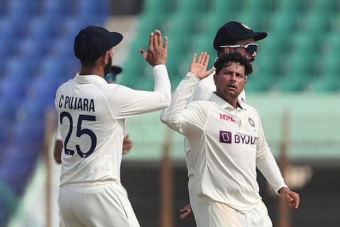 India's Kuldeep Yadav celebrates wicket of Bangladesh's Captain Shakib Al Hasan during the first Test cricket match on day five between Bangladesh and India in Chattogram Bangladesh. (Photo | PTI)