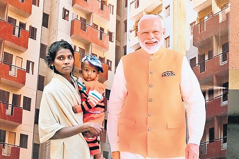 A woman and her child, part of a group of slum dwellers who were part of the event, at the Bhumiheen Camp in Kalkaji on Thursday | express