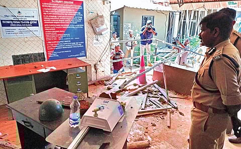 Thiruvananthapuram City Police Commissioner G Sparjan Kumar inspects the Vizhinjam police station on Monday, a day after it was vandalised by protesters | B P Deepu