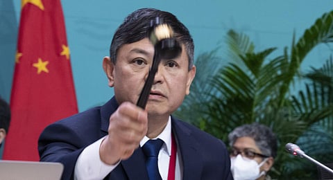 Huang Runqiu, Minister of Ecology and Environment of China and president of the COP15, opens the plenary at the COP15 United Nations conference on biodiversity in Montreal. (Photo | AP)