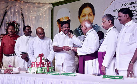 AIADMK interim general secretary Edappadi K Palaniswami cuts the Christmas cake at an event hosted by AIADMK party, at Vanagaram in Chennai. (Photo | P Jawahar, EPS)