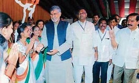 Nobel Laureate Kailash Satyarthi greets schoolchildren in Hanamkonda on Monday