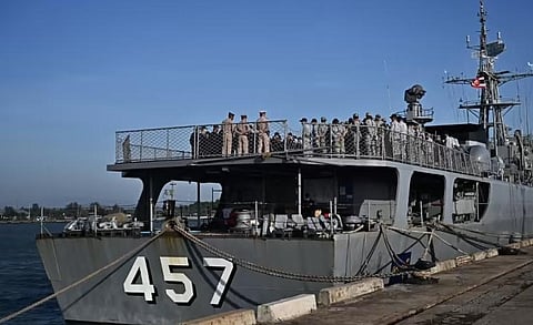 Sailors gather onboard HTMS Kraburi during the search operation for survivors after the Thai naval vessel HTMS Sukhothai. (Photo | AFP)
