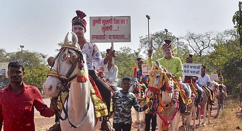 Youths in bridal finery sitting on horses take out a rally campaigning to save the girls, in Solapur. (Photo | PTI)