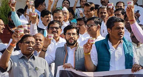 Maha Vikas Aghadi (MVA) MLAs raise slogans during a protest against the state government on the fourth day of the Winter Session of Maharashtra Assembly, in Nagpur. (Photo| PTI)