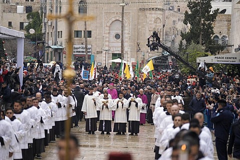 Latin Patriarch Pierbattista Pizzaballa walks towards the Church of the Nativity, traditionally believed to be the birthplace of Jesus Christ, in the West Bank town of Bethlehem. (Photo | AP)