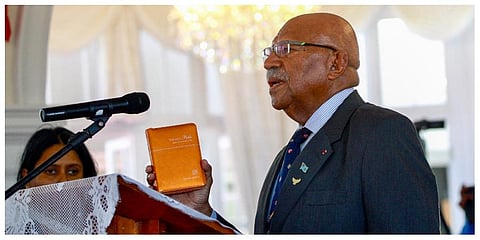 Sitiveni Rabuka is sworn in as the prime minister of Fiji in Suva on Saturday, December 24. (Photo |AP)