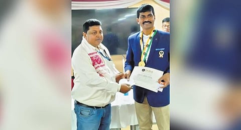 Ratul Kumar Jakharia (right) being felicitated by AAI on Friday. (Photo | Express)