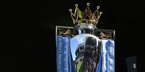 The Premier League trophy is seen on display pitch-side ahead at Craven Cottage in London, Aug. 6, 2022. (File Photo | AFP)