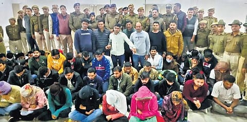The 40 people arrested in the PSC paper leak in Udaipur on Saturday. (Photo | Express)