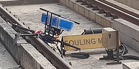 Metro service on the Magenta line was briefly disrupted today after a drone carrying medical supplies fell on the metro track near.(Photo | Delhi Police)