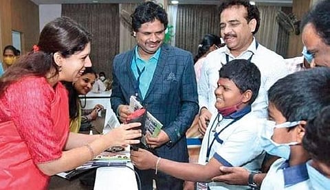 District collector Kritika Shukla interacting with students after releasing the RISE programme module