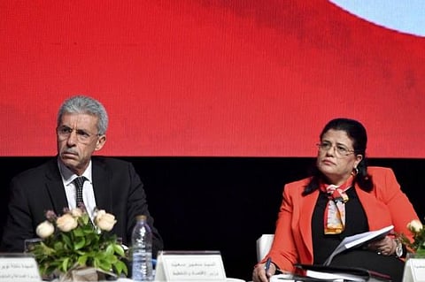 Tunisia's Economy Minister Samir Saied (L) alongside Finance Minister Sihem Boughdiri Nemsia present the country's 2023 finance law during a press conference, in Tunis. (Photo | AFP)