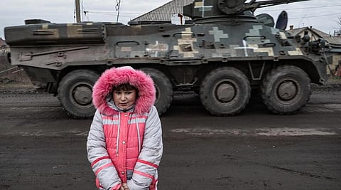 Eight-year-old Lisa Shtanko is one of a few children left in the town of Lyman. (Photo | AFP)