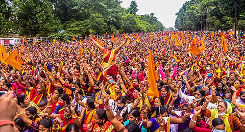 File photo of Members of All Odisha Anganwadi Workers Association from across the State taking out a mass rally demanding fulfilment of their demands at lower PMG in Bhubaneswar. (Photo | Express)