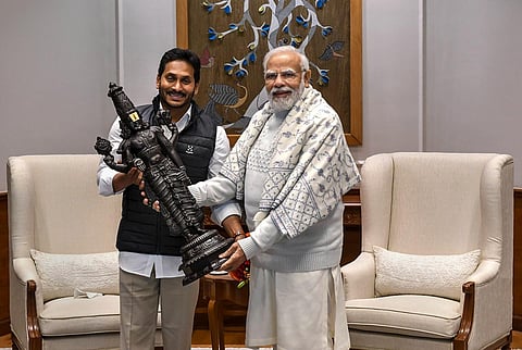 Prime Minister Narendra Modi being presented a memento by Andhra Pradesh Chief Minister Y.S. Jagan Mohan Reddy, in New Delhi, Dec. 28, 2022. (Photo | PTI)