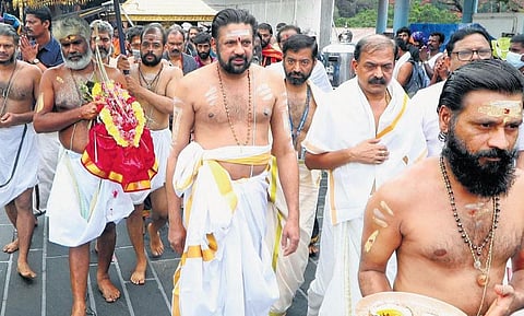 Thantri Kandararu Rajivaru leading the procession carrying ‘brahmakalasam’ as part of the kalabhabhishekam, in connection with Mandala pooja ceremony at Sabarimala temple on Tuesday| Shaji Vettippuram