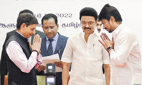 Son becomes minister: Governor R N Ravi greets Udhayanidhi Stalin, as father and chief minister  M K Stalin looks on, at the swearing-in ceremony at Raj Bhavan. | Ashwin Prasath