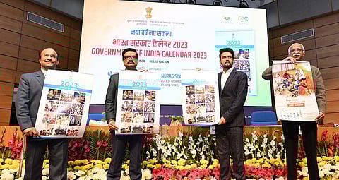 The Union Minister for Information & Broadcasting, Youth Affairs and Sports, Shri Anurag Singh Thakur launches the official Government of India Calendar for the year 2023, in New Delhi. (Photo | PIB)