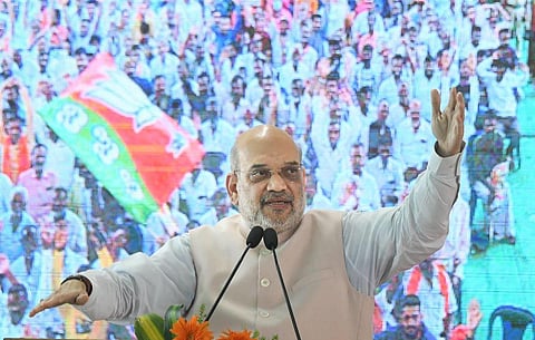 Union Minister and senior BJP leader Amit Shah speaks at Bharatiya Janata Party's Jan Sankalp Yatra rally, in Mandya, Karnataka. (Photo | PTI)