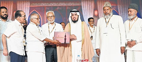 KNM state president T P Abdulla Koya Madani releasing the book ‘Renaissance: Hundred Years of Muslim Enlightenment in Kerala’ brought out by The New Indian Express by handing over a copy to Saudi Emba