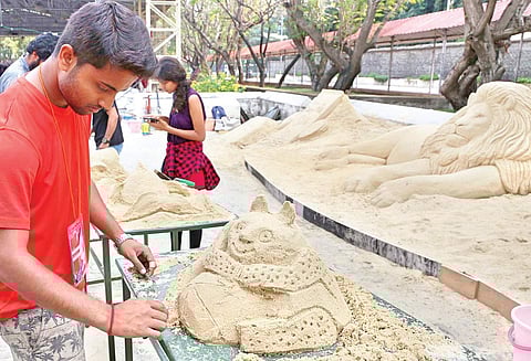 A student working on a sand sculpture. Image used for representational purposes | Express