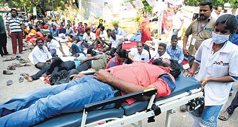 A protester being shifted to hospital after his  health deteriorated | R Satish Babu