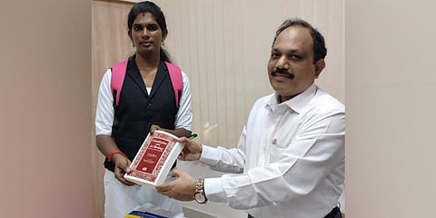 C Rajakumar, secretary of Bar Council of Tamil Nadu and Puducherry, presents a memento to Kanmani. (Photo | Martin Louis, EPS)