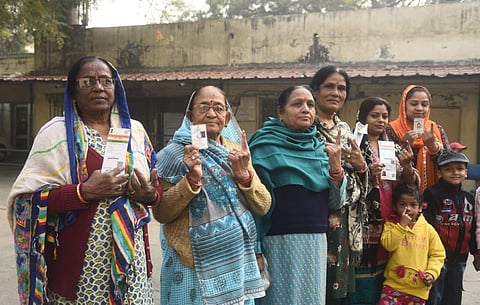 Voters coming out after they cast their vote for MCD election at civil line, in New Delhi on Sunday (Photo | Parveen Negi, EPS)