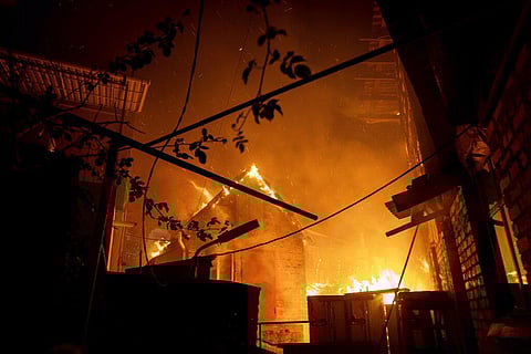 A house burns after a Russian attack in Kherson, Ukraine, Saturday, Dec. 3, 2022 | AP