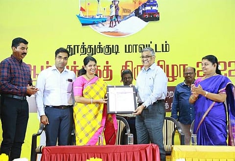 MP Kanimozhi Karunanidhi honouring the former bureaucrat R Balakrishnan. | Express