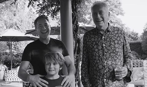 Robert Downey Jr., from left, his son Exton Elias Downey and father Robert Downey Sr. from the documentary 'Sr.' (Netflix via AP)