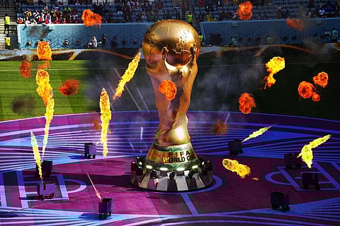 A giant copy of the trophy is displayed prior to the World Cup group G match between Cameroon and Serbia, at the Al Janoub Stadium in Al Wakrah, Nov. 28, 2022. (Photo | AP)