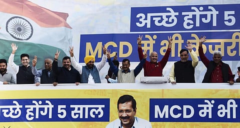 Delhi Chief Minister Arvind Kejriwal, Deputy Chief Minister Manish Sisodia and Punjab Chief Minister Bhagwant Mann seen seen celebrating after AAP's win in the MCD polls. (Photo | Parveen Negi, EPS)